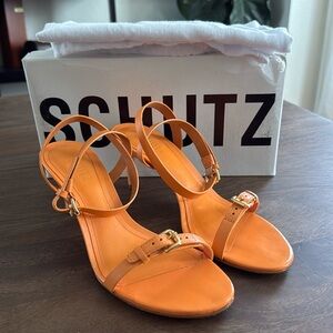 Sandals by Schutz, size -US8,5, color - orange, condition- good with box.